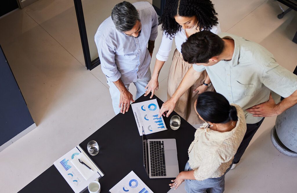 Group of people reviewing data